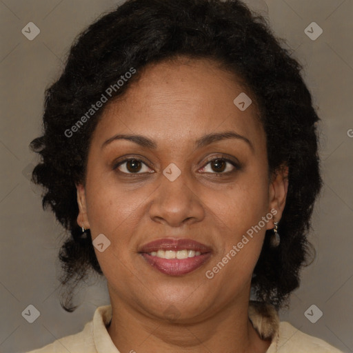 Joyful black adult female with short  brown hair and brown eyes