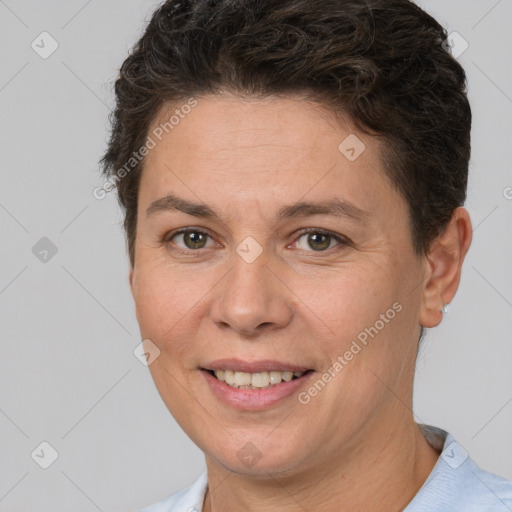 Joyful white adult female with short  brown hair and brown eyes