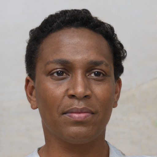 Neutral black young-adult female with short  brown hair and brown eyes
