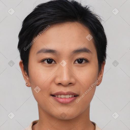 Joyful asian young-adult female with short  black hair and brown eyes