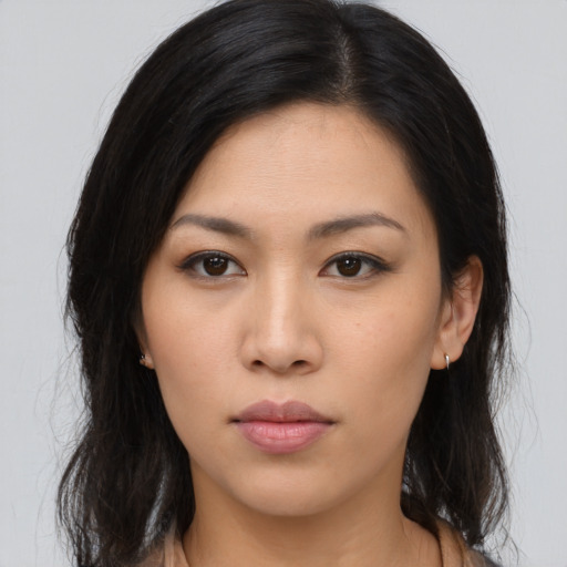 Neutral asian young-adult female with long  brown hair and brown eyes