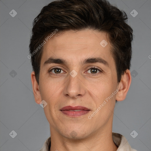 Joyful white adult male with short  brown hair and brown eyes