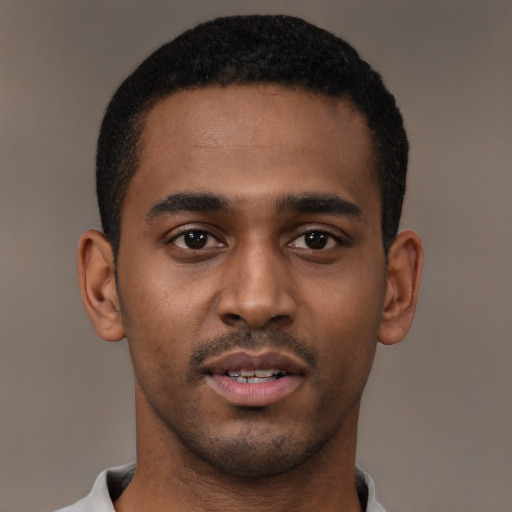 Neutral black young-adult male with short  black hair and brown eyes