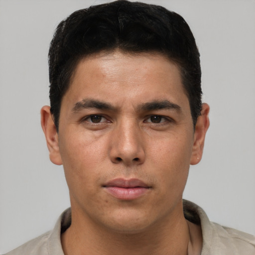 Neutral latino young-adult male with short  brown hair and brown eyes