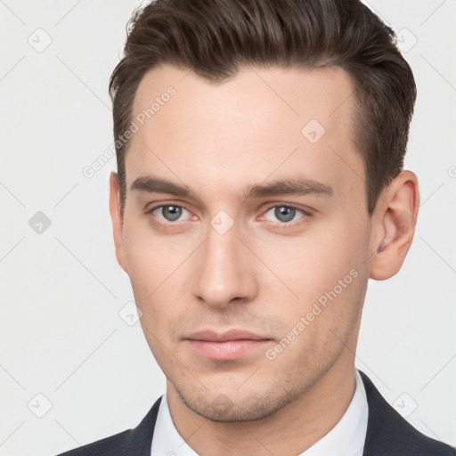 Neutral white young-adult male with short  brown hair and brown eyes