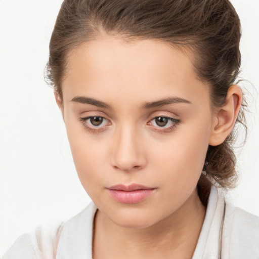 Neutral white child female with medium  brown hair and brown eyes