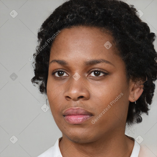 Neutral black young-adult female with short  black hair and brown eyes