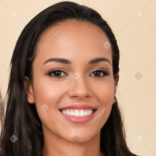 Joyful latino young-adult female with long  brown hair and brown eyes