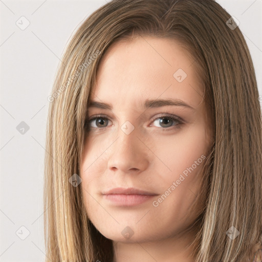 Neutral white young-adult female with long  brown hair and brown eyes