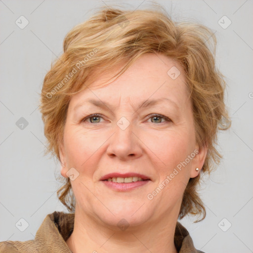 Joyful white adult female with medium  brown hair and blue eyes