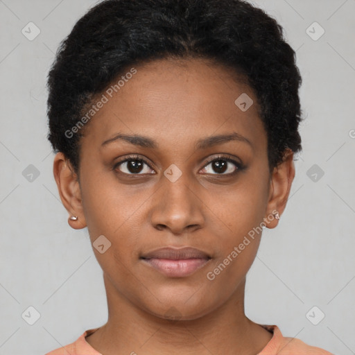 Joyful black young-adult female with short  brown hair and brown eyes
