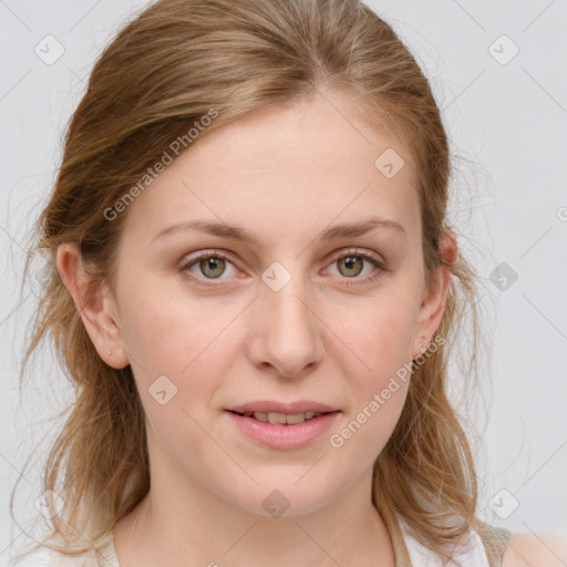 Joyful white young-adult female with medium  brown hair and blue eyes