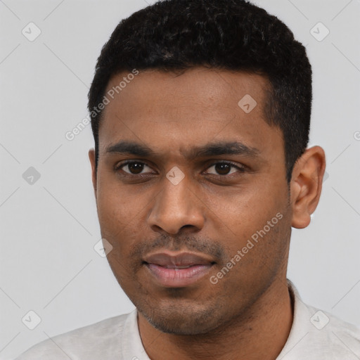 Neutral latino young-adult male with short  black hair and brown eyes
