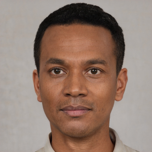 Neutral black young-adult male with short  black hair and brown eyes