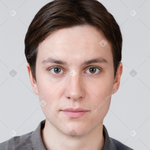 Neutral white young-adult male with short  brown hair and grey eyes