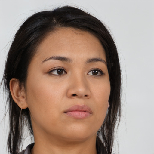 Neutral asian young-adult female with medium  brown hair and brown eyes