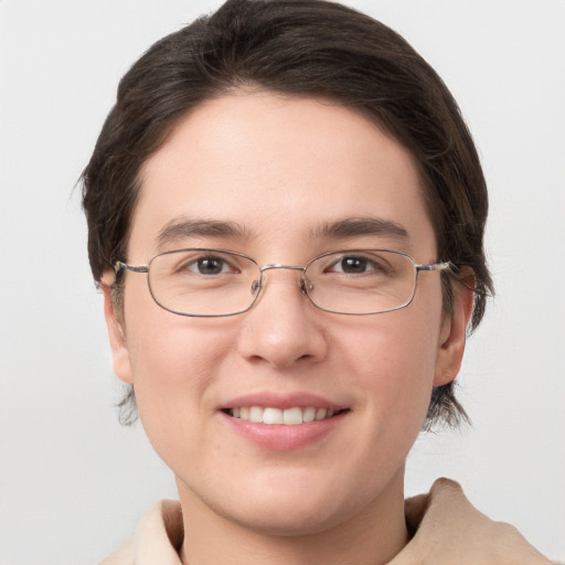 Joyful white young-adult female with short  brown hair and grey eyes