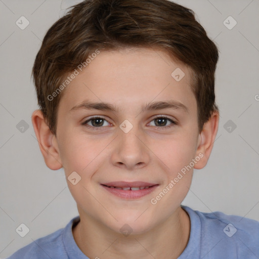 Joyful white child male with short  brown hair and brown eyes