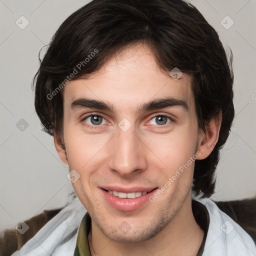 Joyful white young-adult male with medium  brown hair and brown eyes