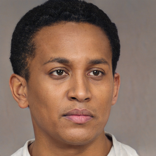 Neutral latino young-adult male with short  brown hair and brown eyes