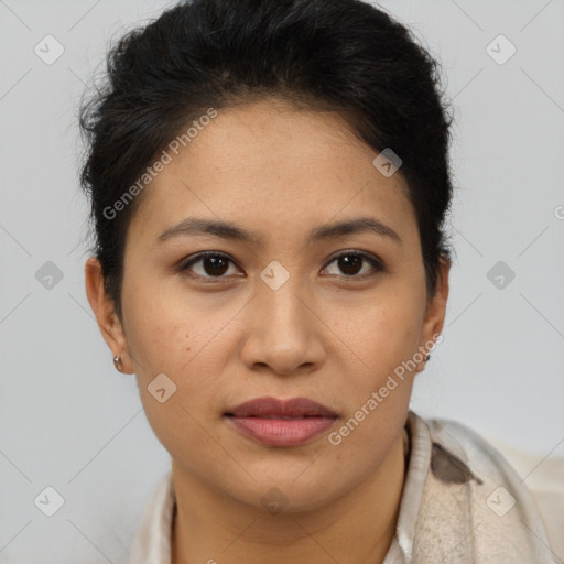 Joyful latino young-adult female with short  brown hair and brown eyes