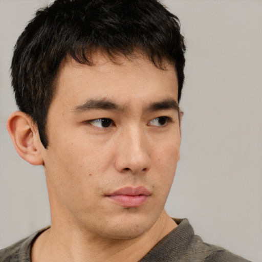 Neutral asian young-adult male with short  brown hair and brown eyes