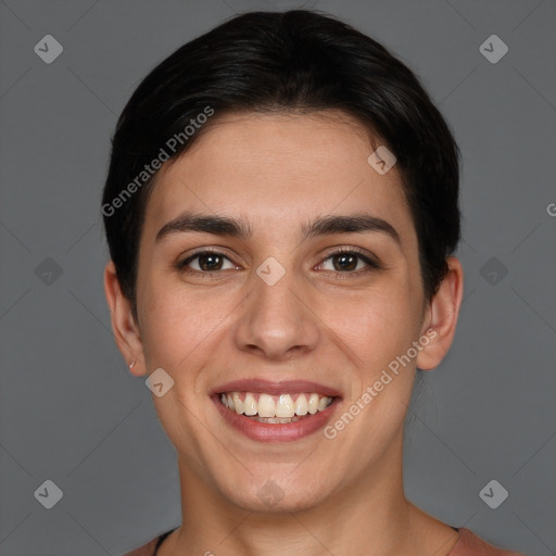 Joyful white young-adult female with short  brown hair and brown eyes