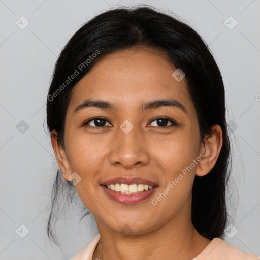 Joyful asian young-adult female with medium  black hair and brown eyes