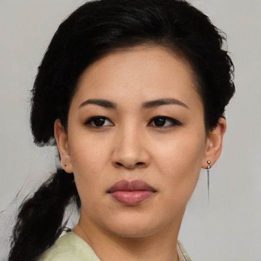 Neutral latino young-adult female with medium  black hair and brown eyes