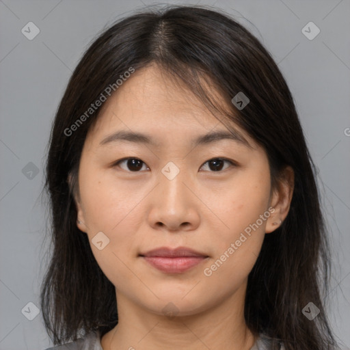 Neutral asian young-adult female with medium  brown hair and brown eyes