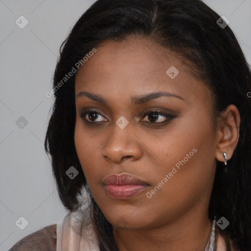 Neutral black young-adult female with long  brown hair and brown eyes