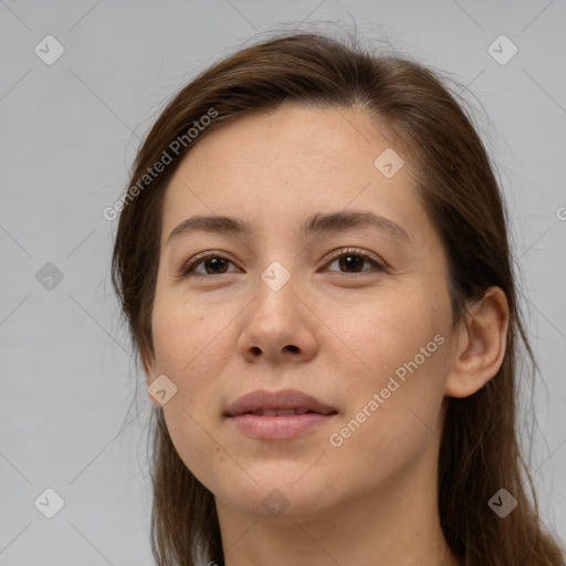 Joyful white young-adult female with long  brown hair and brown eyes