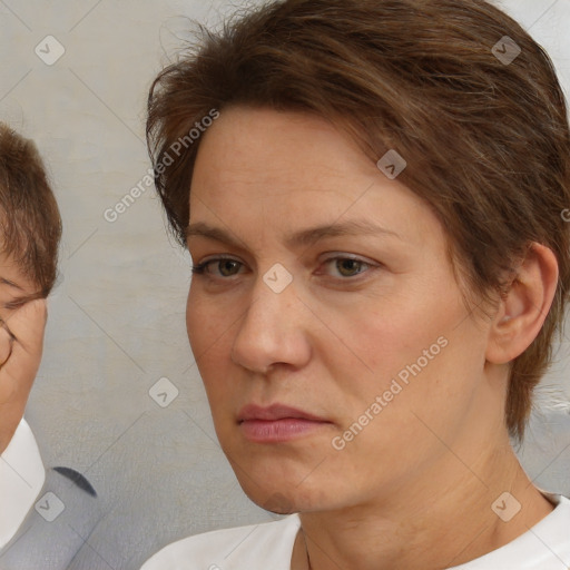 Neutral white adult female with medium  brown hair and brown eyes