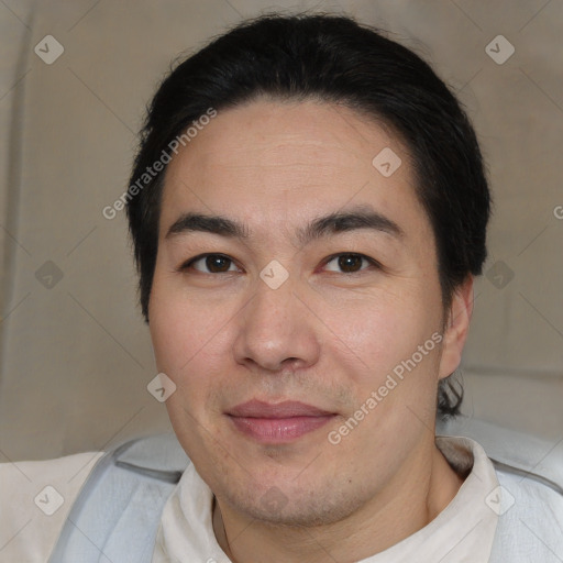 Joyful white adult male with short  black hair and brown eyes