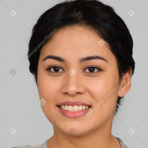 Joyful asian young-adult female with medium  black hair and brown eyes