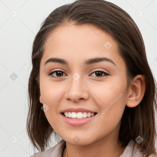 Joyful white young-adult female with medium  brown hair and brown eyes