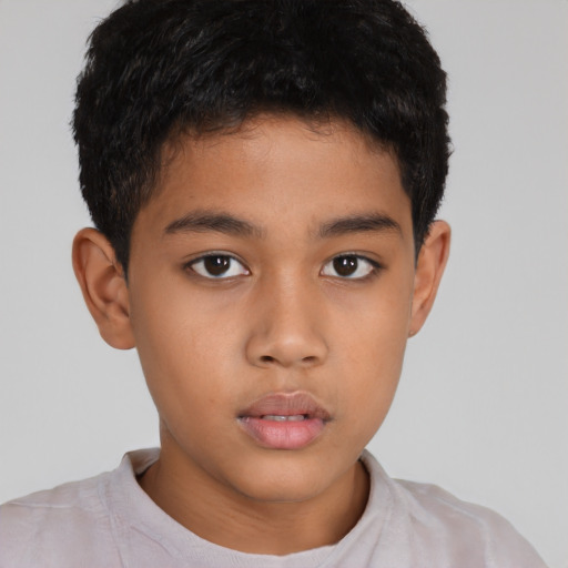 Neutral latino child male with short  brown hair and brown eyes