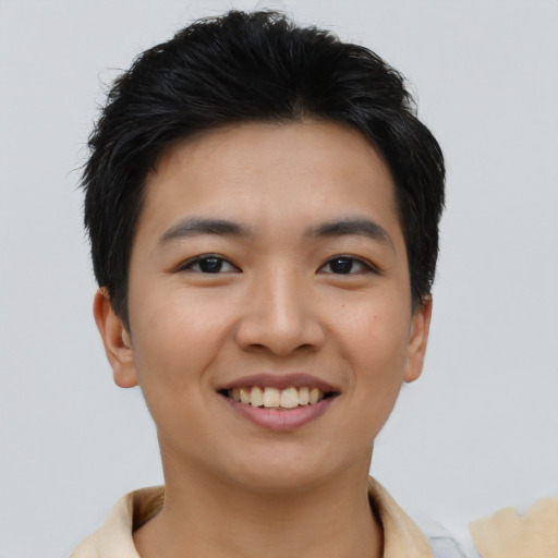 Joyful asian young-adult female with short  brown hair and brown eyes