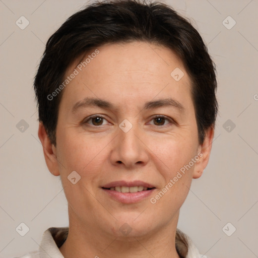 Joyful white adult female with short  brown hair and brown eyes