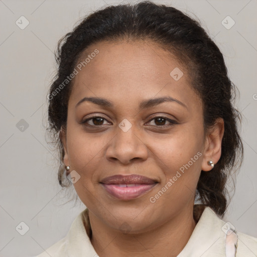 Joyful latino adult female with medium  brown hair and brown eyes