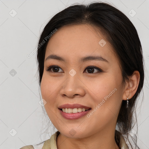 Joyful white young-adult female with medium  brown hair and brown eyes