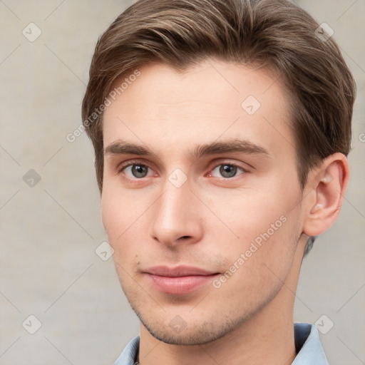 Neutral white young-adult male with short  brown hair and grey eyes