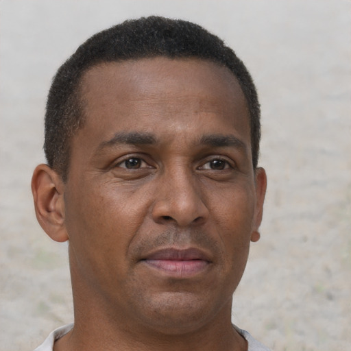 Neutral black young-adult male with short  brown hair and brown eyes