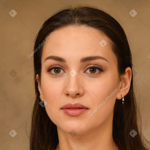 Neutral white young-adult female with long  brown hair and brown eyes