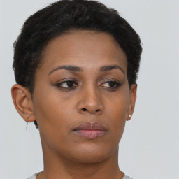 Neutral black young-adult female with short  brown hair and brown eyes