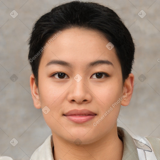 Joyful asian young-adult female with short  brown hair and brown eyes