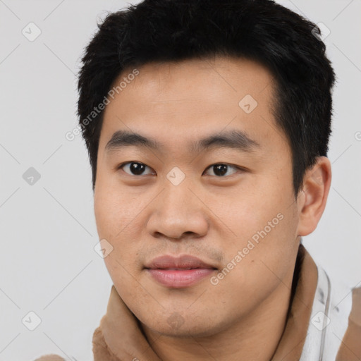 Neutral asian young-adult male with short  black hair and brown eyes