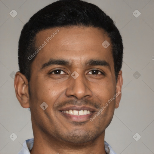 Joyful latino young-adult male with short  brown hair and brown eyes