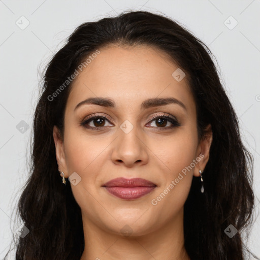 Joyful latino young-adult female with long  brown hair and brown eyes