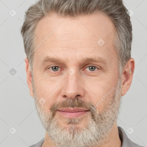 Neutral white middle-aged male with short  brown hair and brown eyes